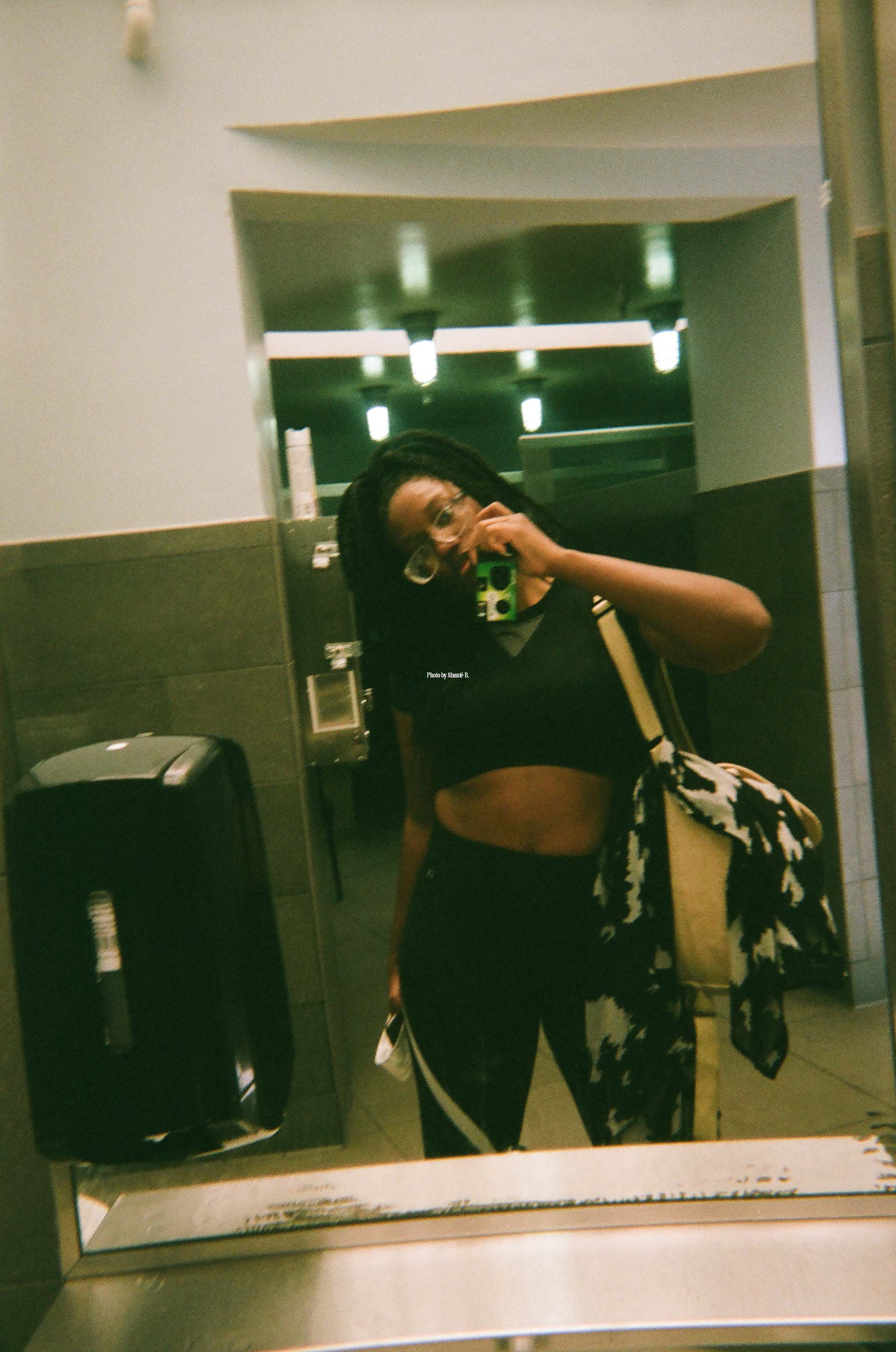 Apicture of Shanté taking a mirror selfie.